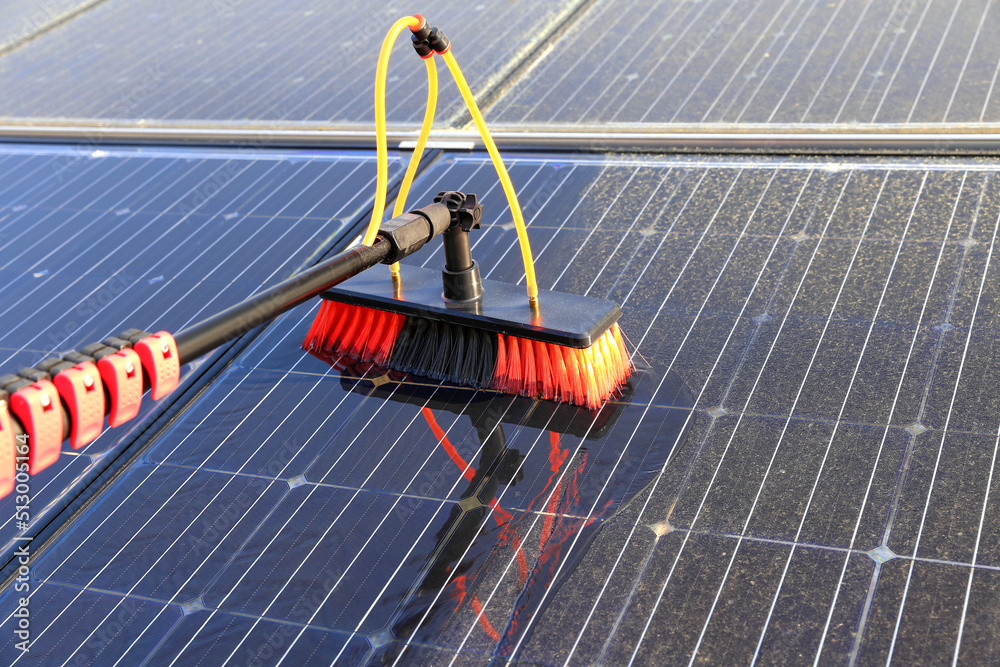 Gentle pure-water rinse flowing across a solar panel